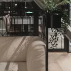 Kove sofa with flower pots at Fora Form