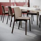Atrium Wood stoler i mørkbeiset eik og fasteputer i en kantine fra Fora Form